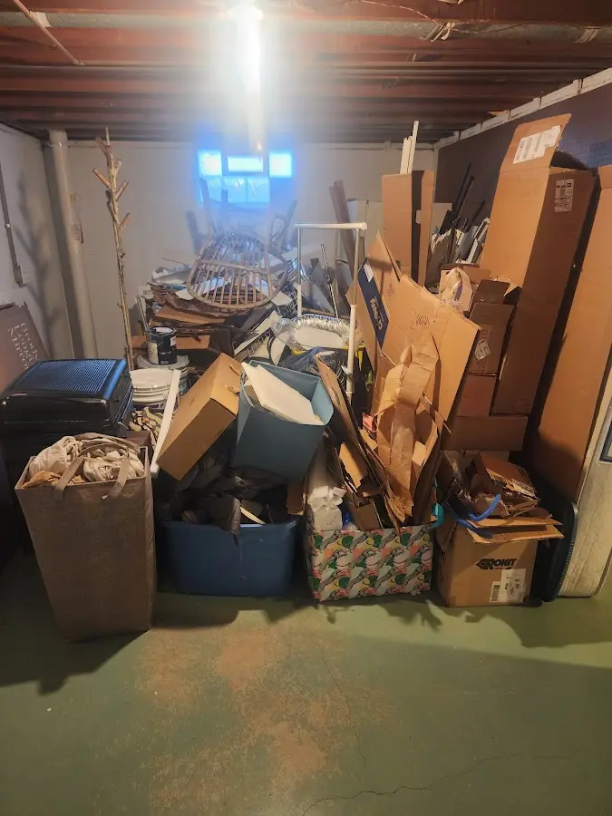 Roll-off dumpster container at job site for 2 Yard Dumpster Rental in Richland Hills